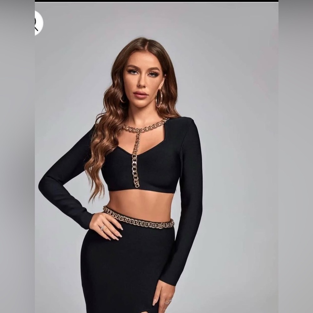 Elegant Black Chain-Detail Crop Top and a skirt